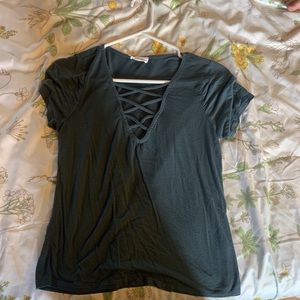 Teal shirt with cutouts